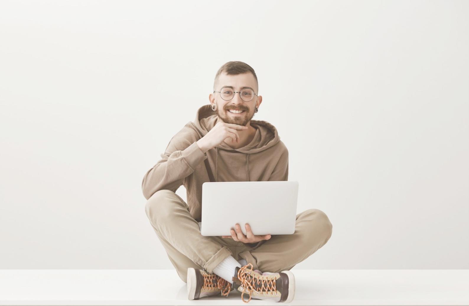 Developer reviewing automated testing results on multiple monitors
